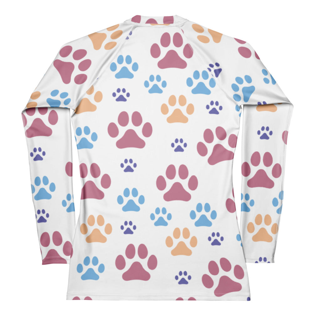 White long sleeve rash guard with colorful pink blue and orange paw prints buttery soft fabric and UPF 50+ protection