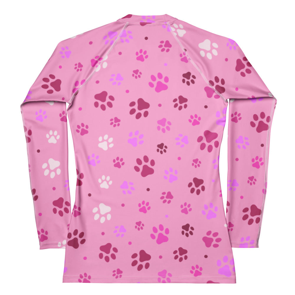 Women’s pink long sleeve rash guard with playful paw print pattern buttery soft fabric and upf 50+ protection