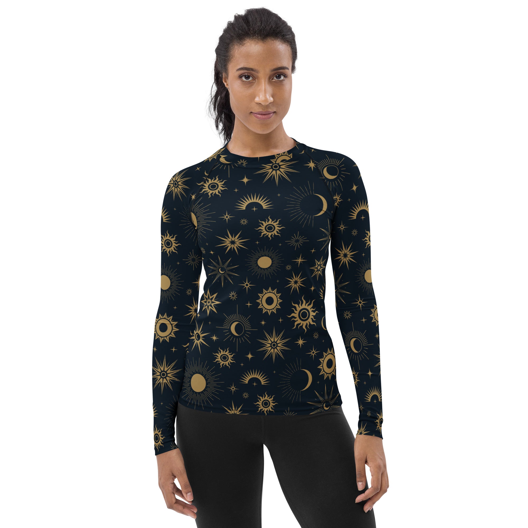 Women’s dark navy long sleeve rash guard swim shirt with buttery soft fabric and gold celestial sun moon star pattern
