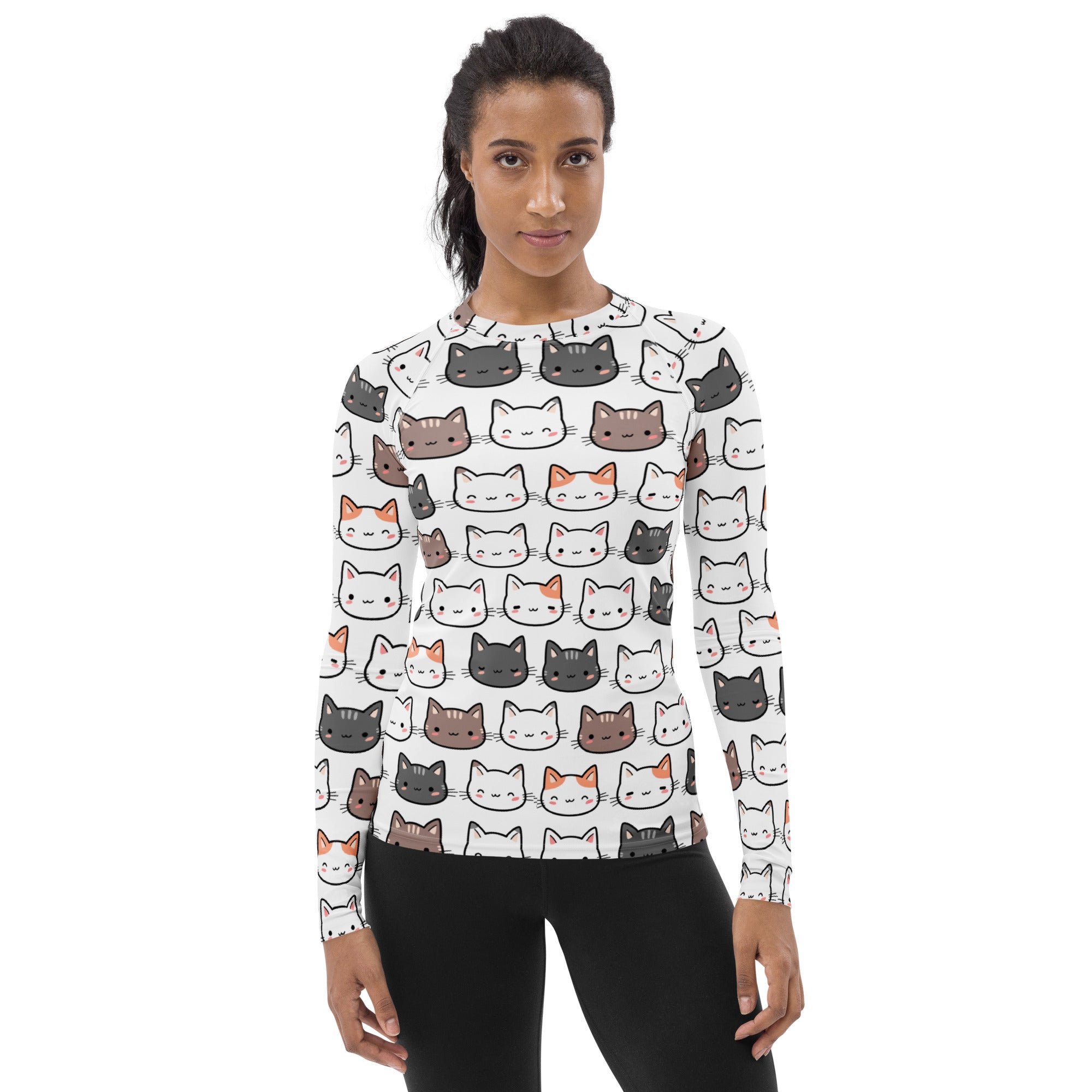 White women’s long sleeve rash guard swim shirt with playful colorful cartoon cat faces and UPF 50 plus buttery soft fabric