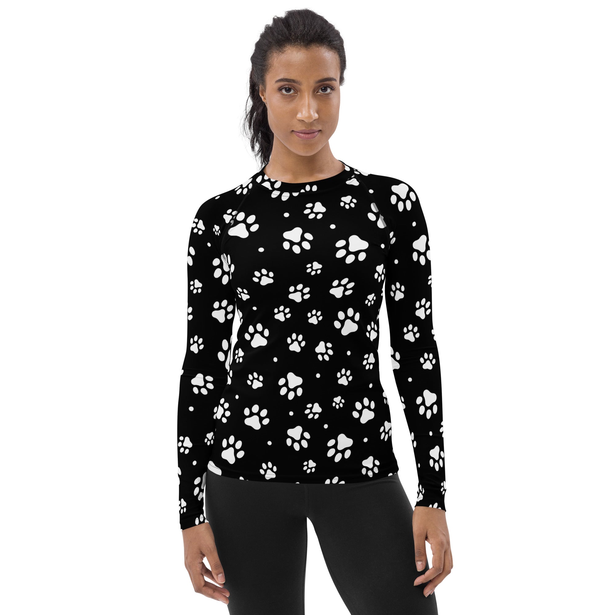 Women’s black long sleeve rash guard swim shirt with white paw print pattern buttery soft fabric and UPF 50+ protection