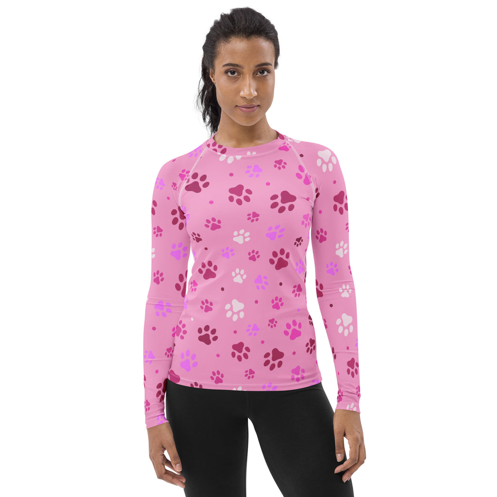 Women’s pink paw print buttery soft long sleeve rash guard swim shirt with upf 50 plus in playful paw pattern