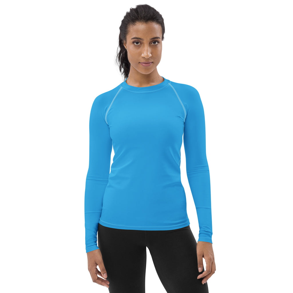 Women’s sky blue buttery soft long sleeve rash guard swim shirt with subtle seam detailing and UPF 50 plus protection