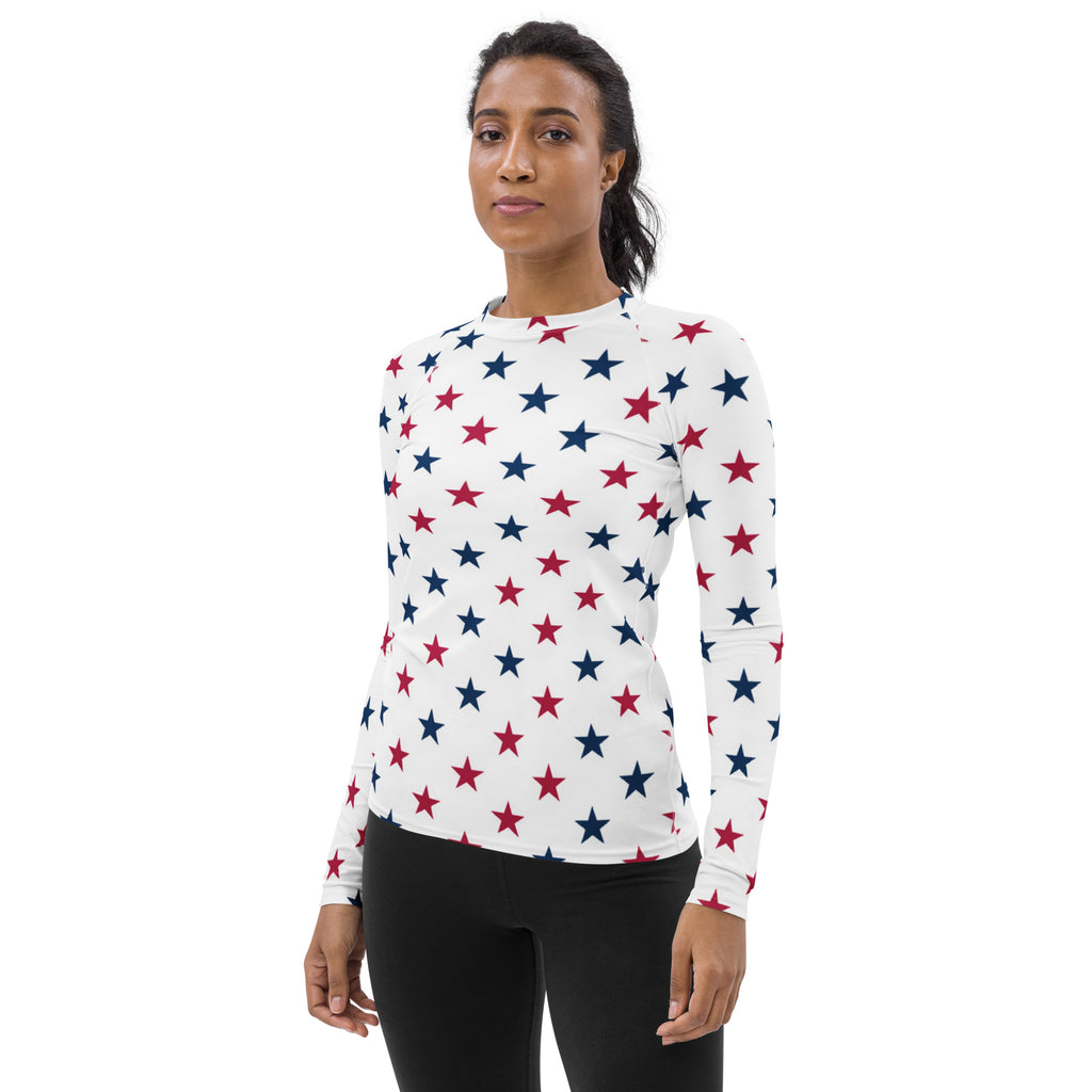 White long-sleeved buttery soft rash guard swim shirt with red and blue star pattern and UPF 50 plus protection