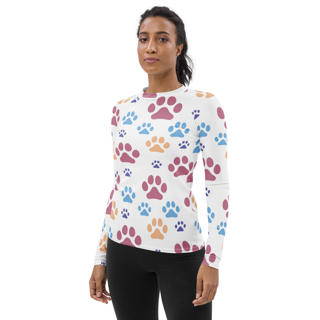 White long-sleeved buttery soft rash guard swim shirt with colorful paw prints and upf 50 plus protection