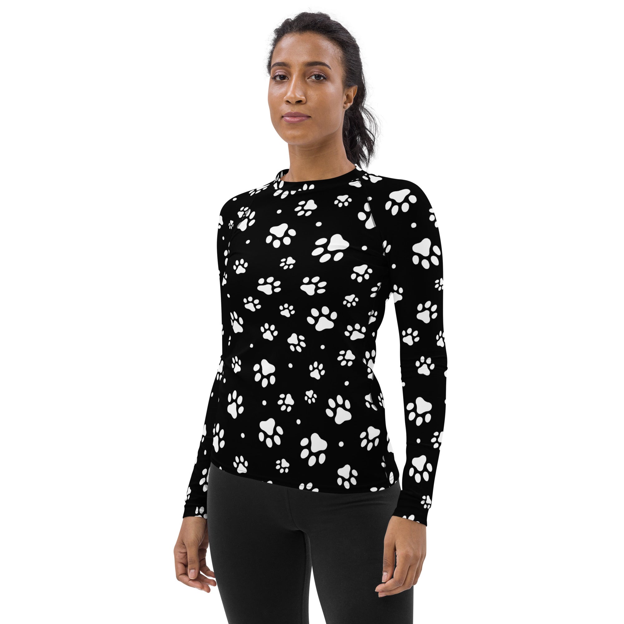 Women’s black long-sleeved rash guard swim shirt with white paw print pattern buttery soft fabric upf 50+