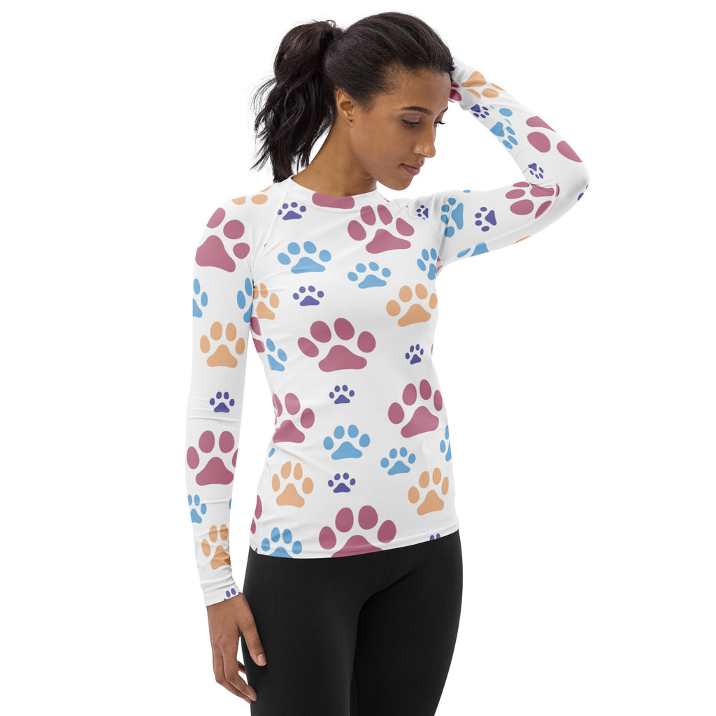 White long-sleeved rash guard swim shirt with colorful paw prints in pink blue and orange buttery soft with upf 50+
