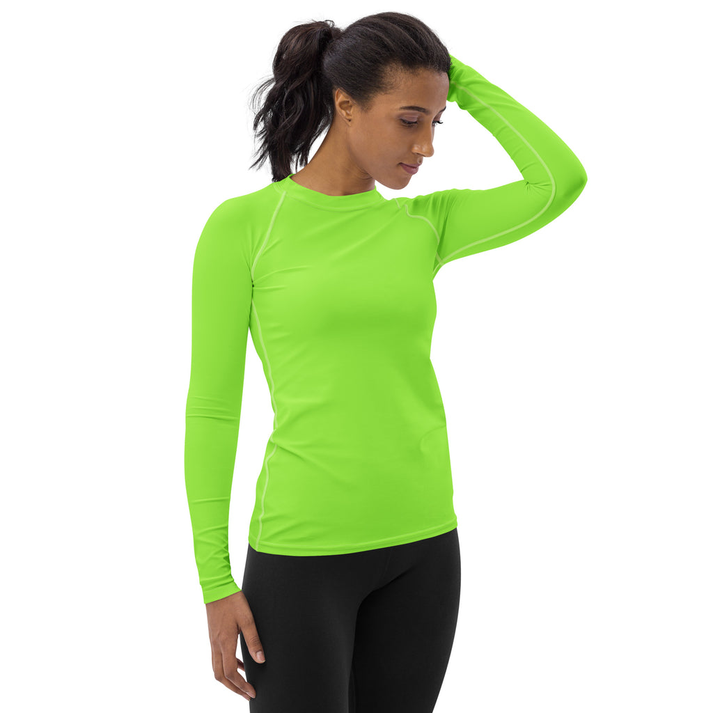 Bright neon green long-sleeved athletic rash guard with snug fit and buttery soft fabric for UPF 50+ sun protection