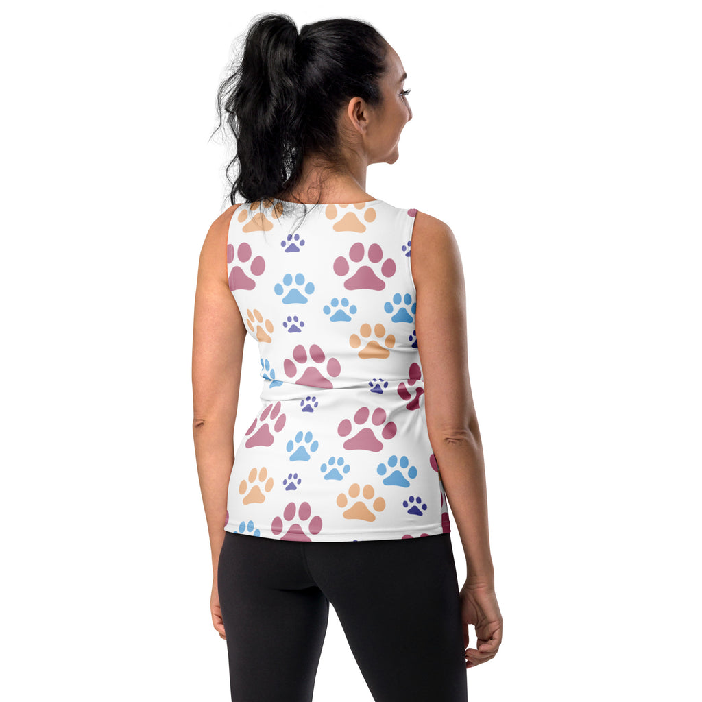 White sleeveless tank top with colorful paw print pattern in pink blue and tan made of quick drying buttery soft fabric with upf 50+