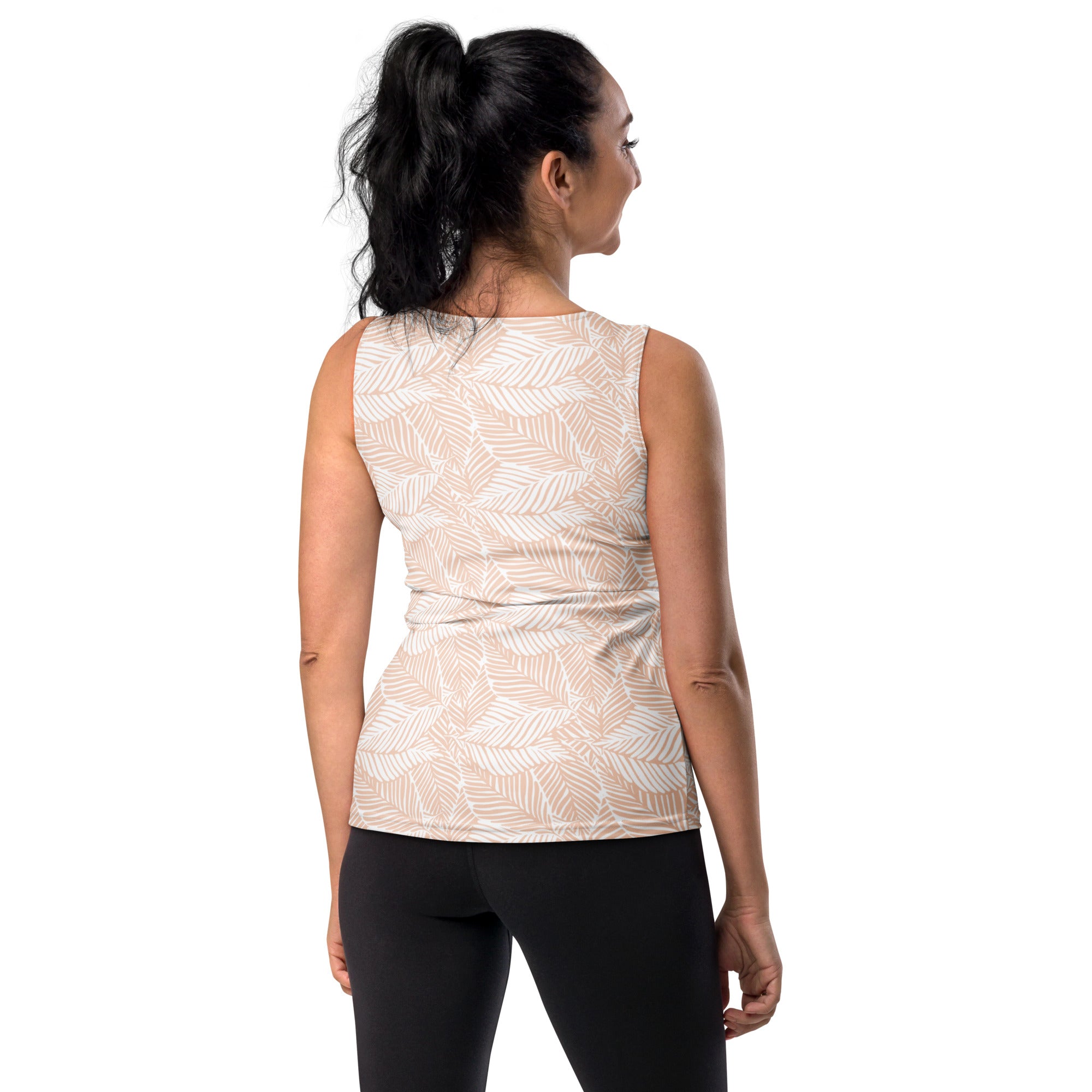 Women’s beige sleeveless tank top with subtle white palm leaf pattern made of quick drying buttery soft fabric