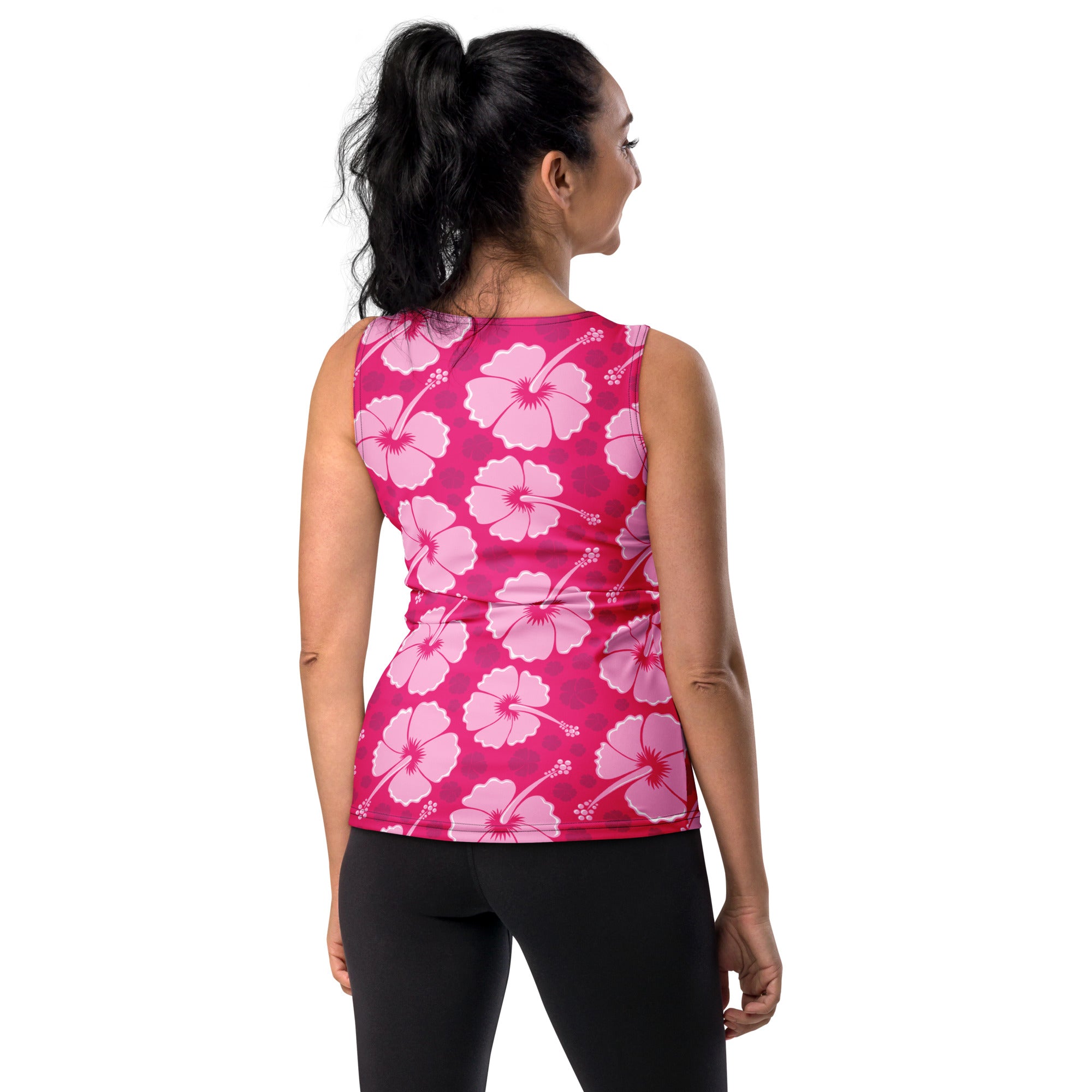 A vibrant pink women’s tropical hibiscus floral tank top with quick drying buttery soft fabric and UPF 50+ protection