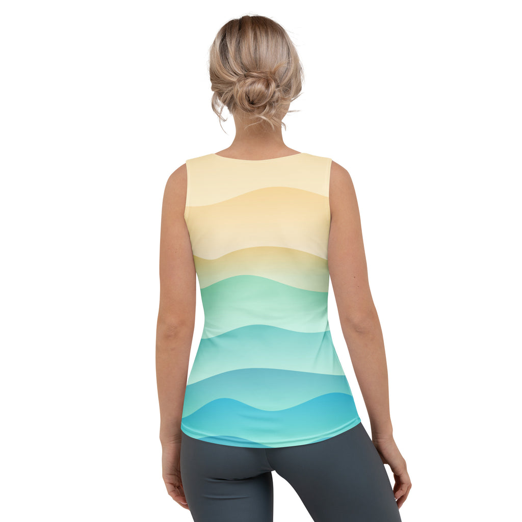 Back view of women’s coastal wave tank top with soft yellow to teal gradient waves made of quick drying buttery soft fabric with upf 50+
