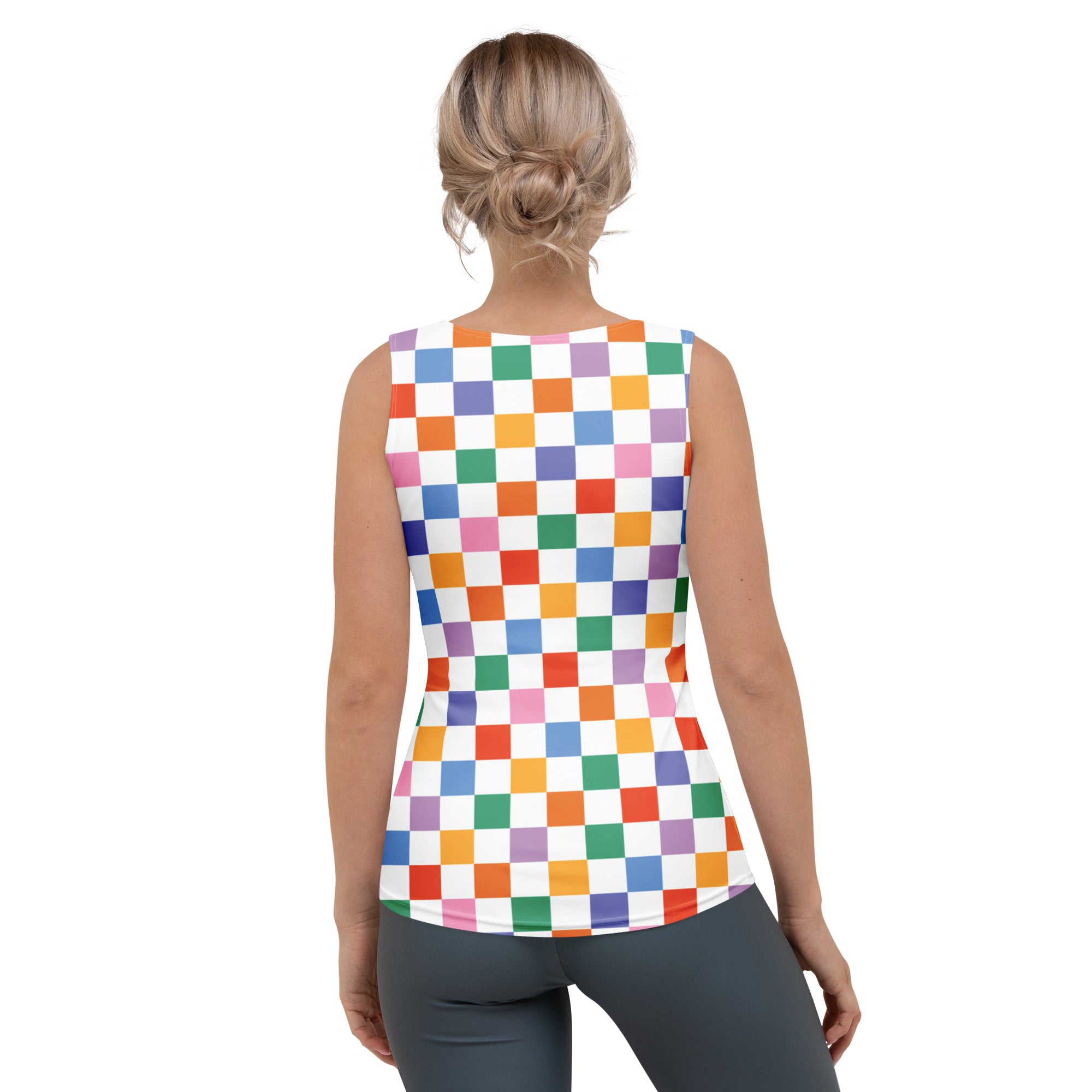 A vibrant sleeveless women’s tank top with a colorful rainbow checkerboard pattern on buttery soft quick drying fabric