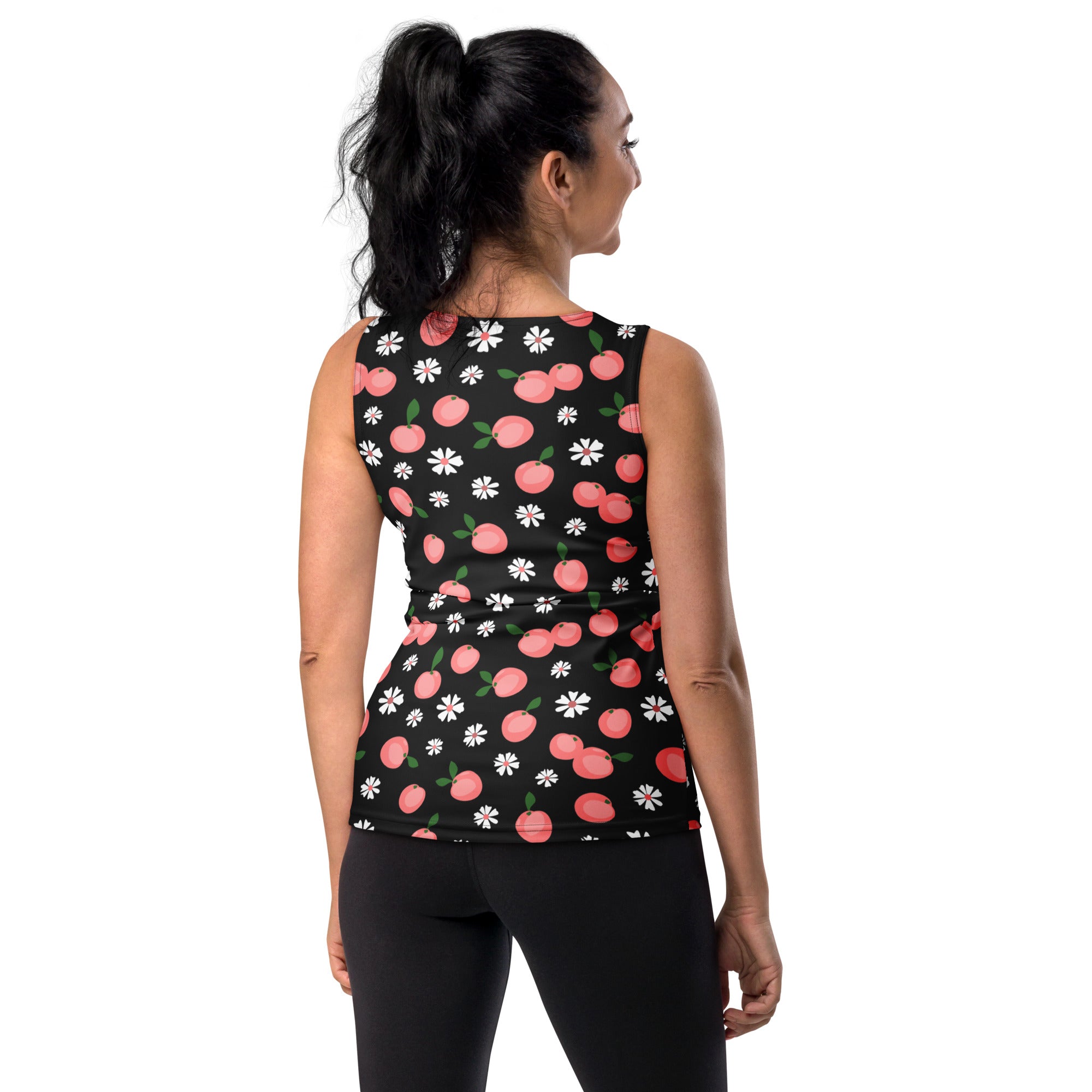 Black sleeveless women’s tank top with pink peach and white daisy print made of quick drying buttery soft fabric with UPF 50+