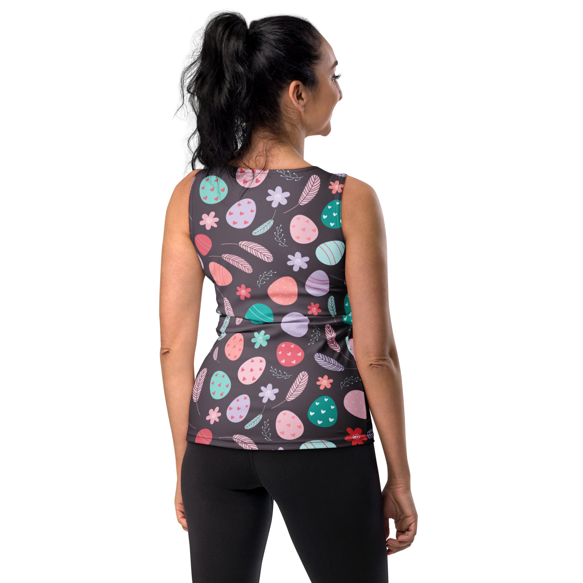 Women’s black sleeveless athletic top with pastel floral Easter egg pattern made of quick drying buttery fabric with UPF 50+