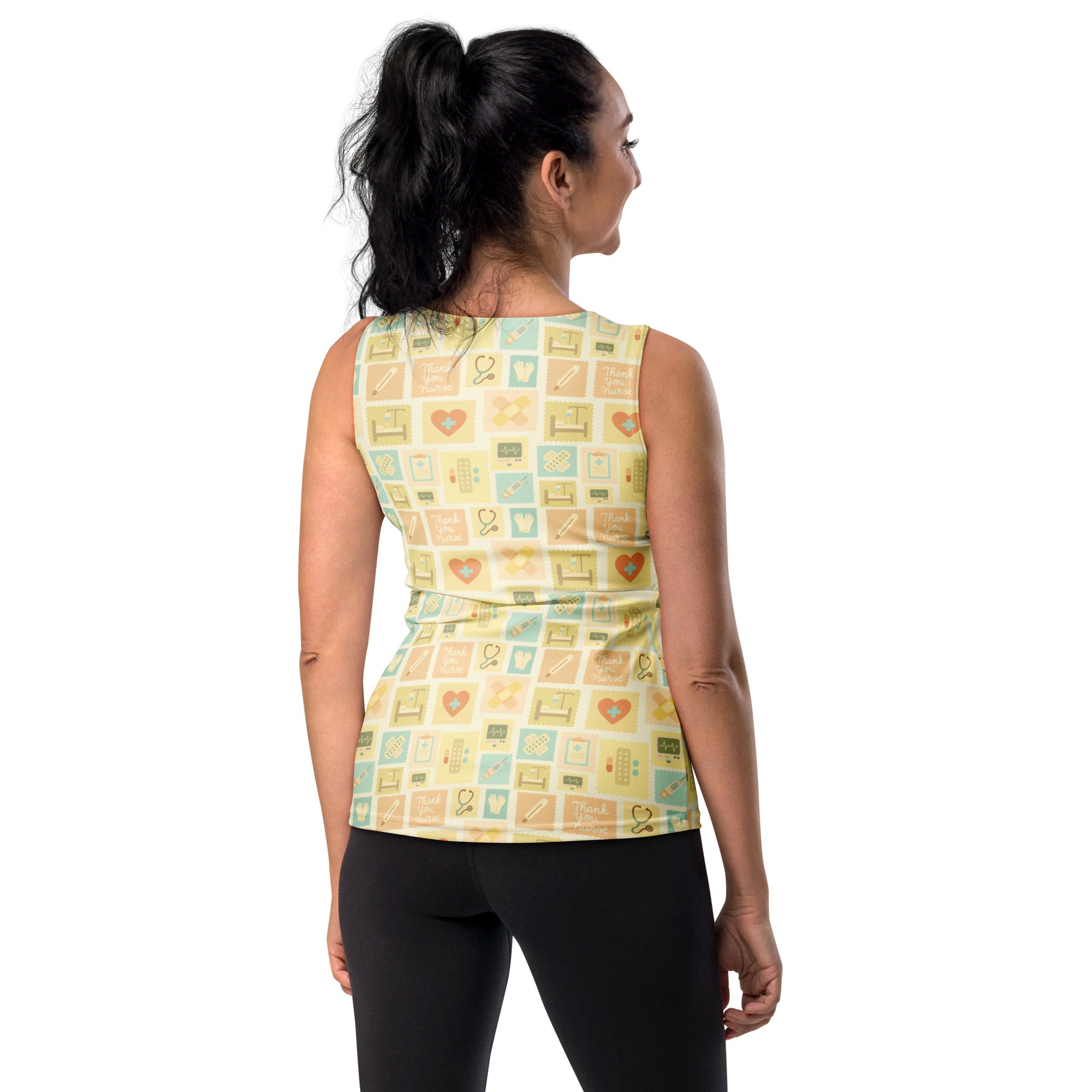 Women’s yellow nurse icon tank top with quick drying buttery soft fabric and medical icon pattern in pastel squares