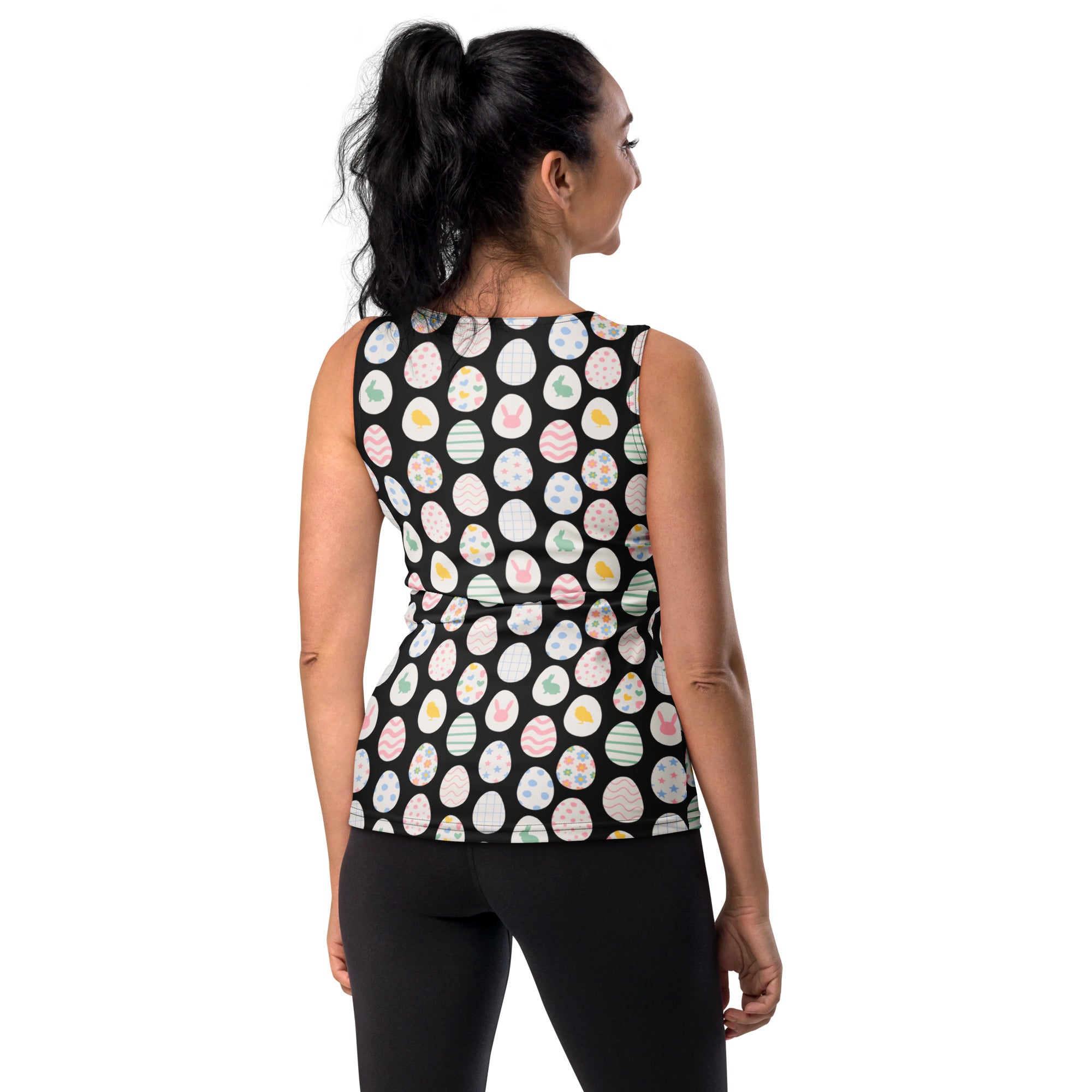 Black sleeveless peplum tank top with playful pastel easter egg and bunny pattern made of quick drying buttery soft fabric with upf 50+