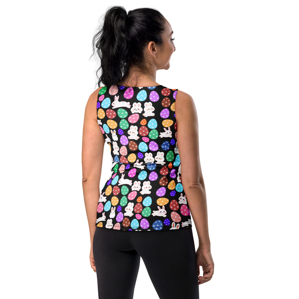 Women’s black sleeveless peplum top with colorful easter eggs and bunnies in quick drying buttery soft fabric with upf 50+