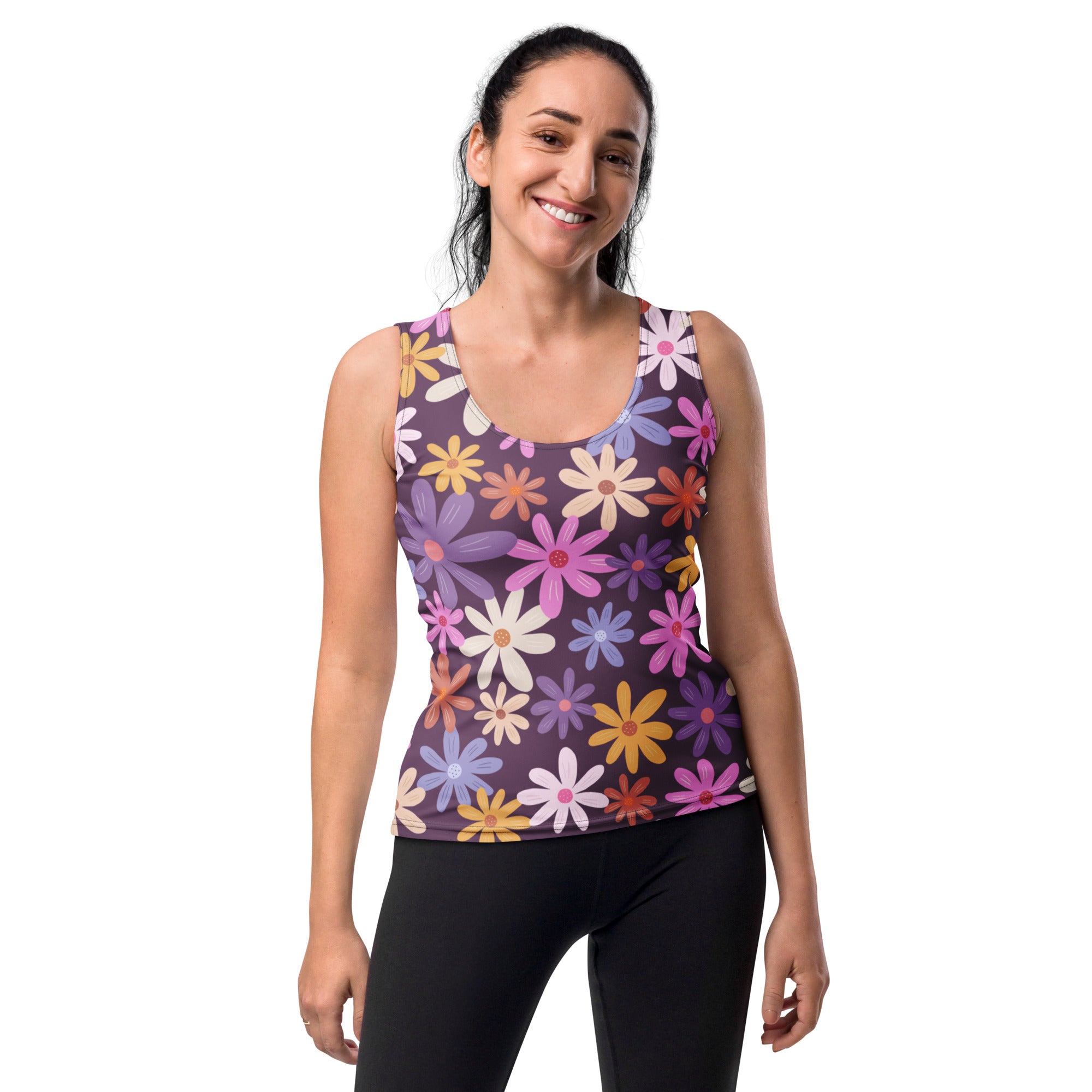 A women’s retro purple floral tank top with colorful daisies made of quick drying, buttery soft fabric with UPF 50+