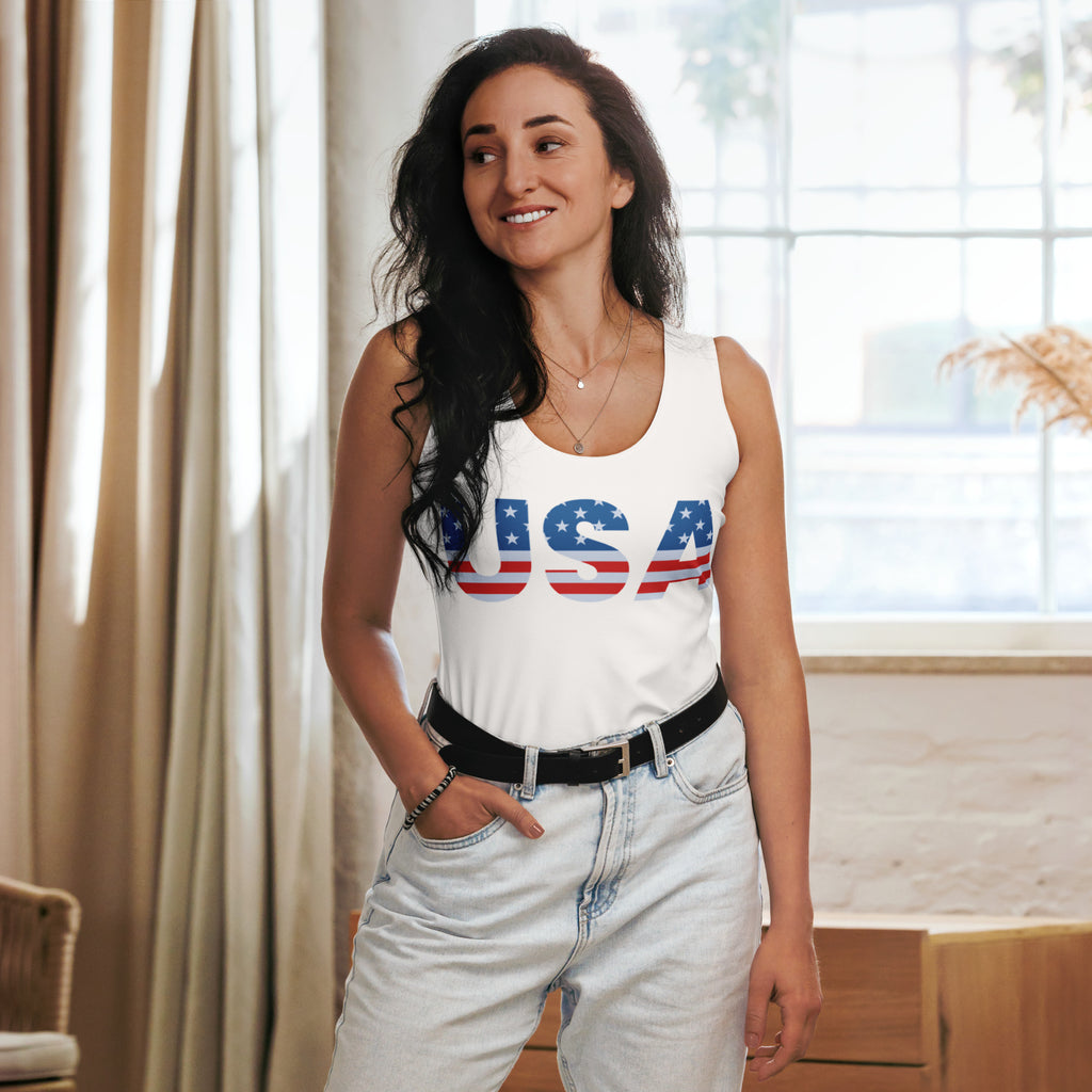 White sleeveless women’s usa tank top with bold red white and blue star lettering made from quick drying buttery soft fabric with upf 50+