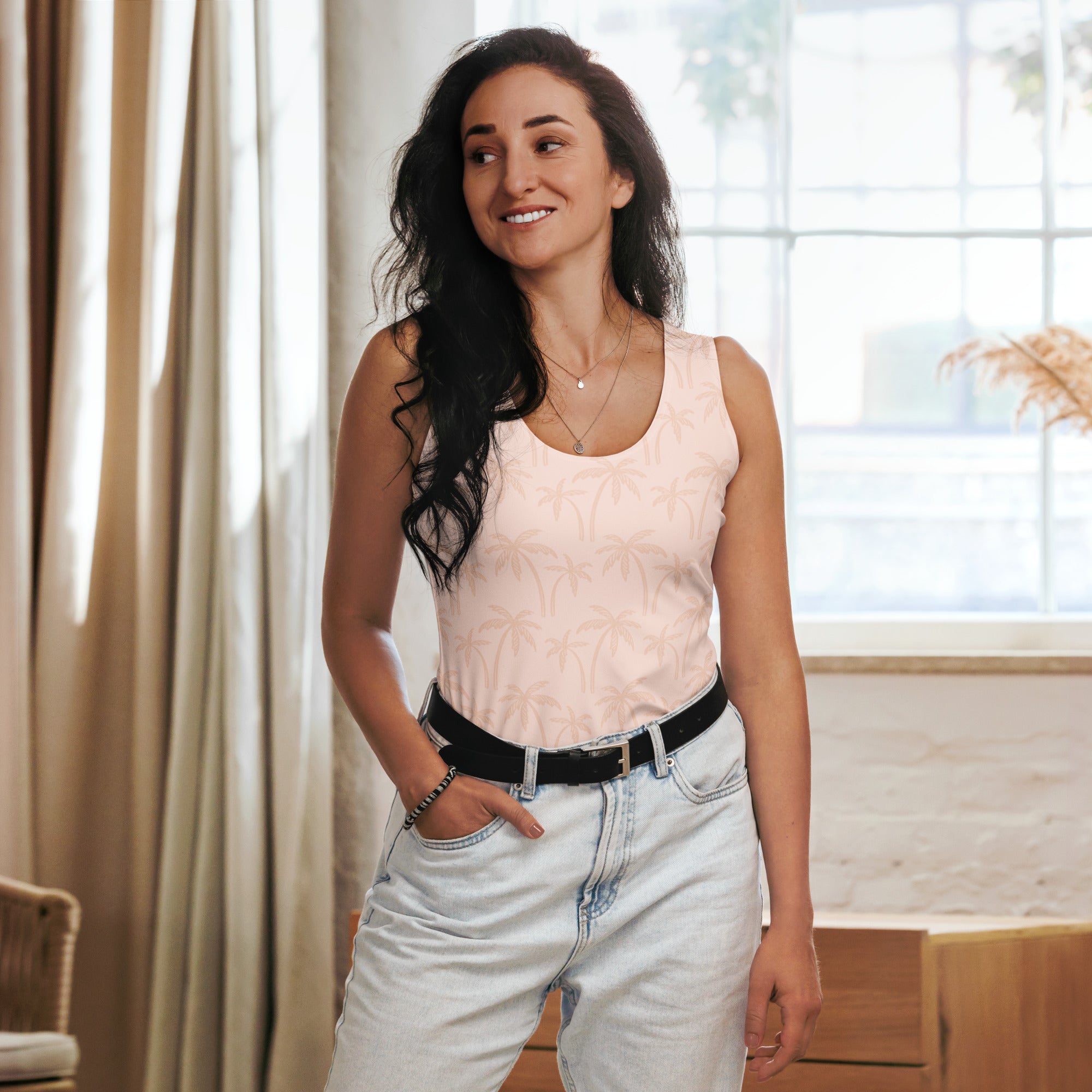 Women’s light beige palm tree tank top in buttery soft quick-drying fabric with upf 50 plus and subtle leaf pattern