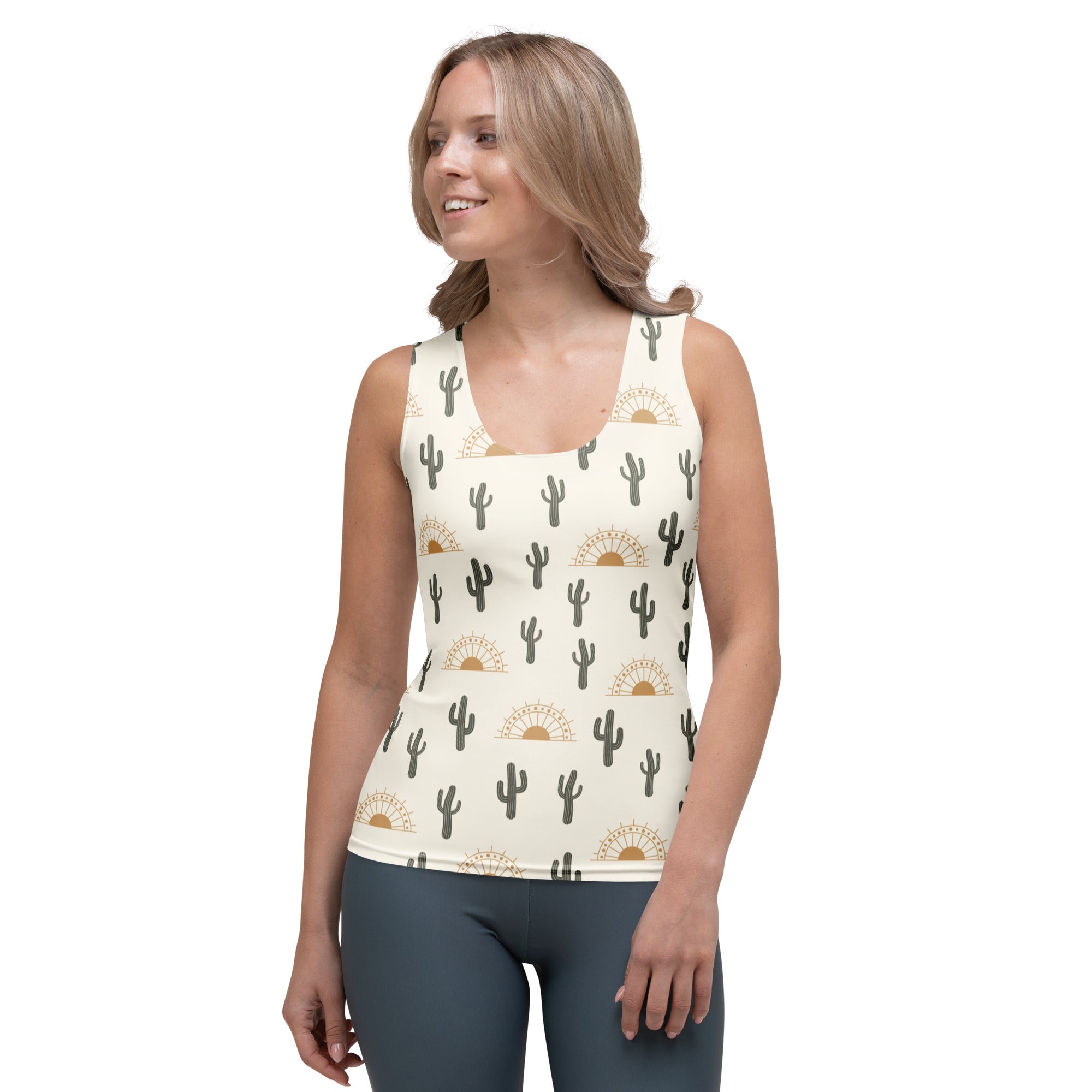 Cream-colored women’s tank top with black cactus and gold sunburst pattern made of buttery soft quick drying fabric with UPF 50+