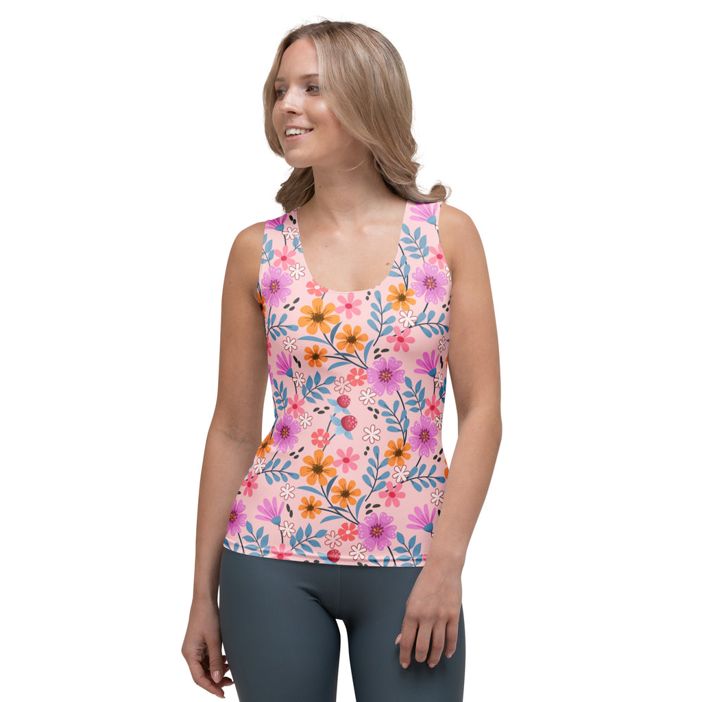 Women’s pink floral tank top with vibrant flowers made of buttery soft quick drying fabric with upf 50 plus protection