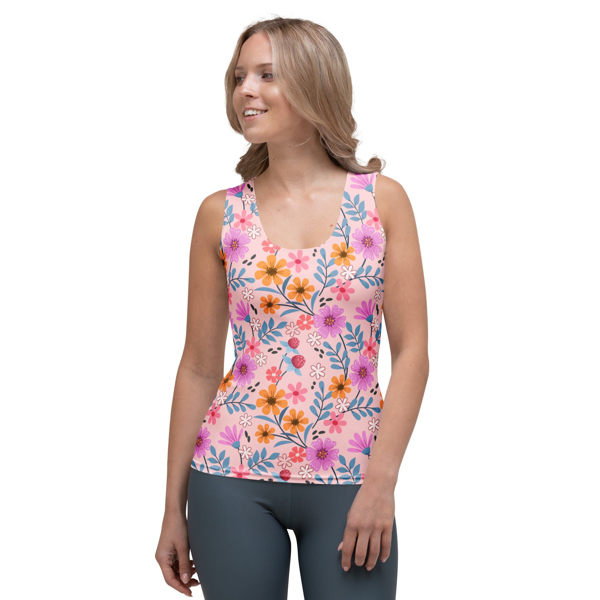 Women’s pink floral tank top with vibrant flowers made of buttery soft quick drying fabric with upf 50 plus protection