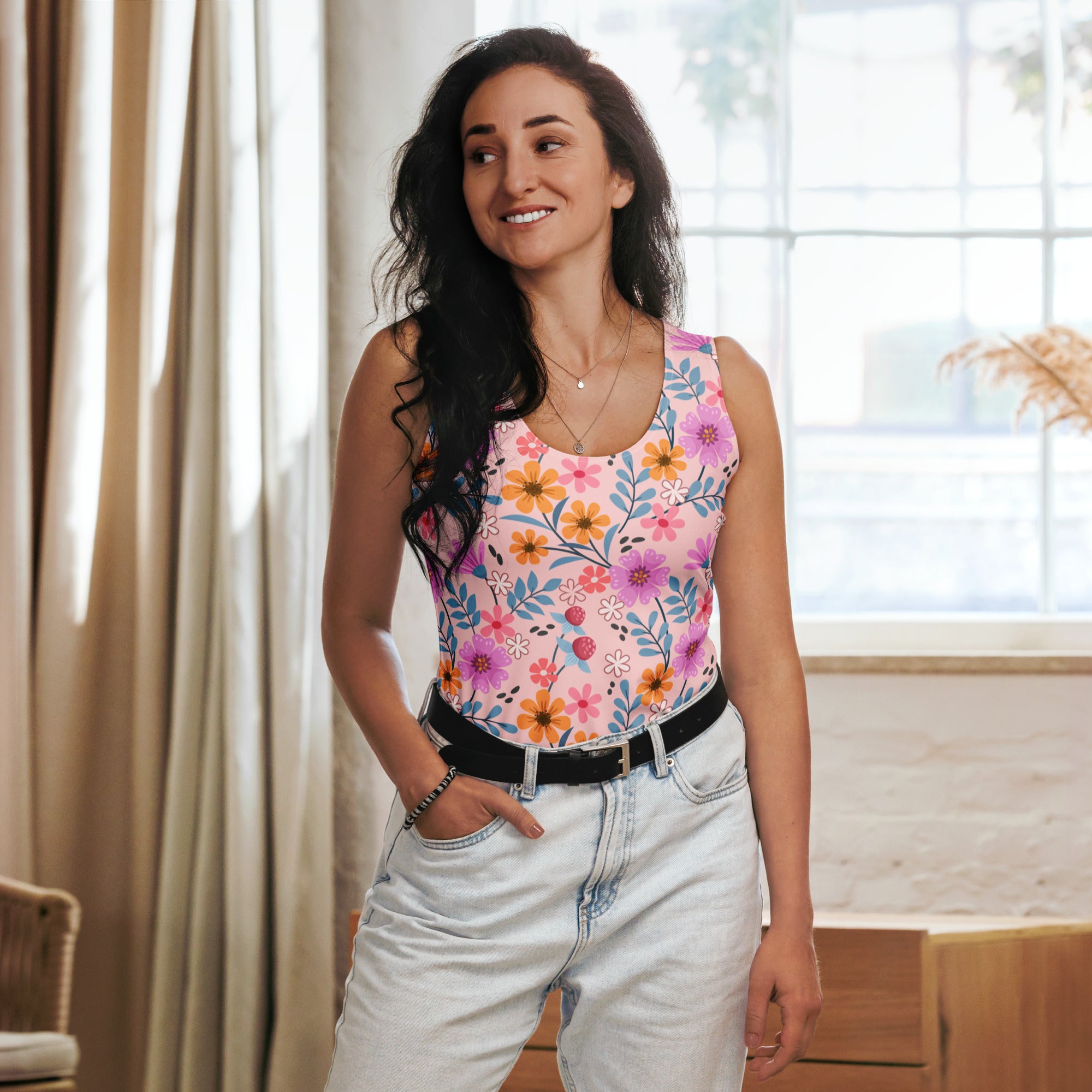 Women’s pink floral tank top with vibrant flowers in quick drying buttery soft fabric and upf 50 plus protection