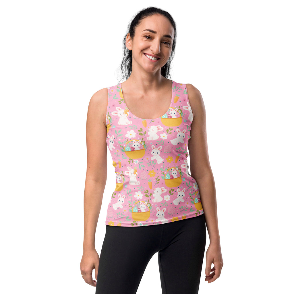 Women’s pink easter bunny tank top with white bunnies and yellow baskets on buttery soft quick drying fabric with upf 50+