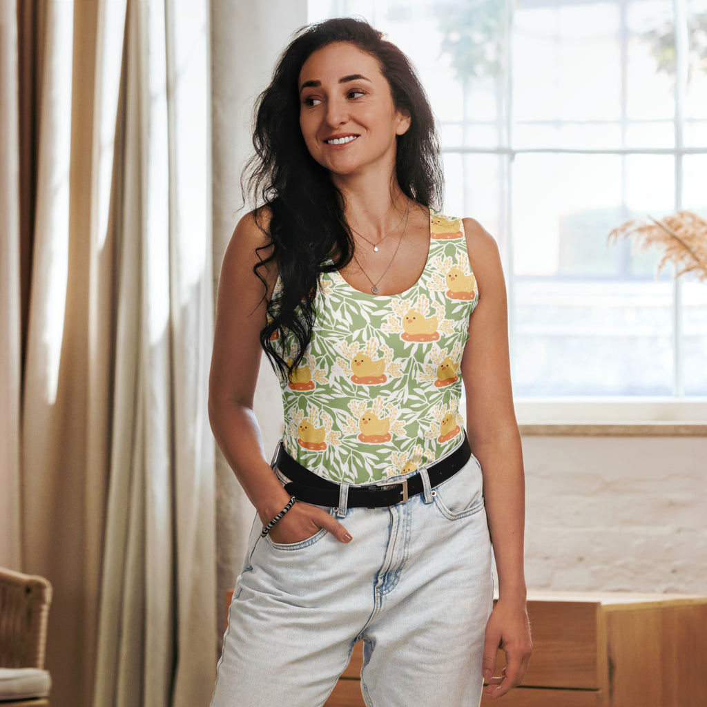 Women’s sage green tank top with playful yellow rubber duck and white vine pattern made of quick drying buttery soft fabric with UPF 50+