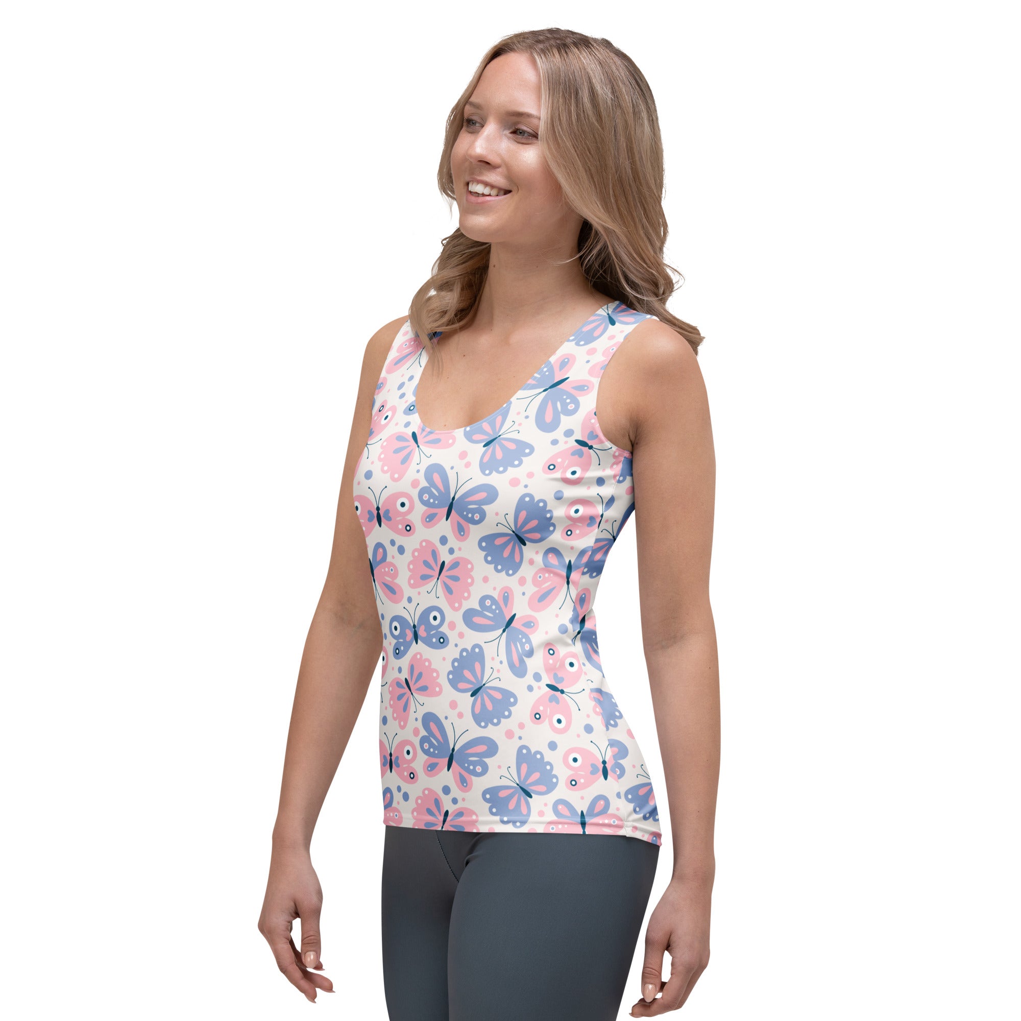 Women’s white tank top with pink and blue butterfly pattern made of quick drying, buttery soft fabric with upf 50+