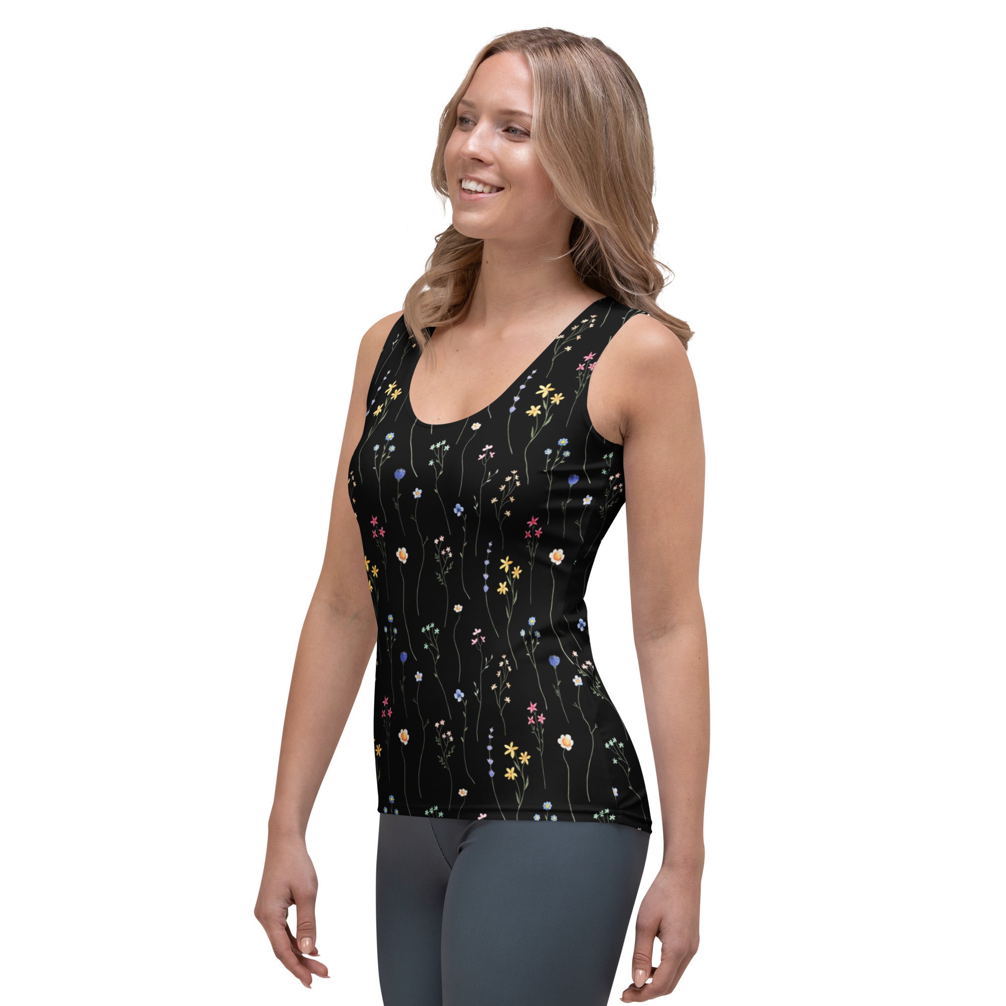 Women’s black wildflower tank top with delicate multicolored floral pattern made of quick drying buttery soft fabric with upf 50+