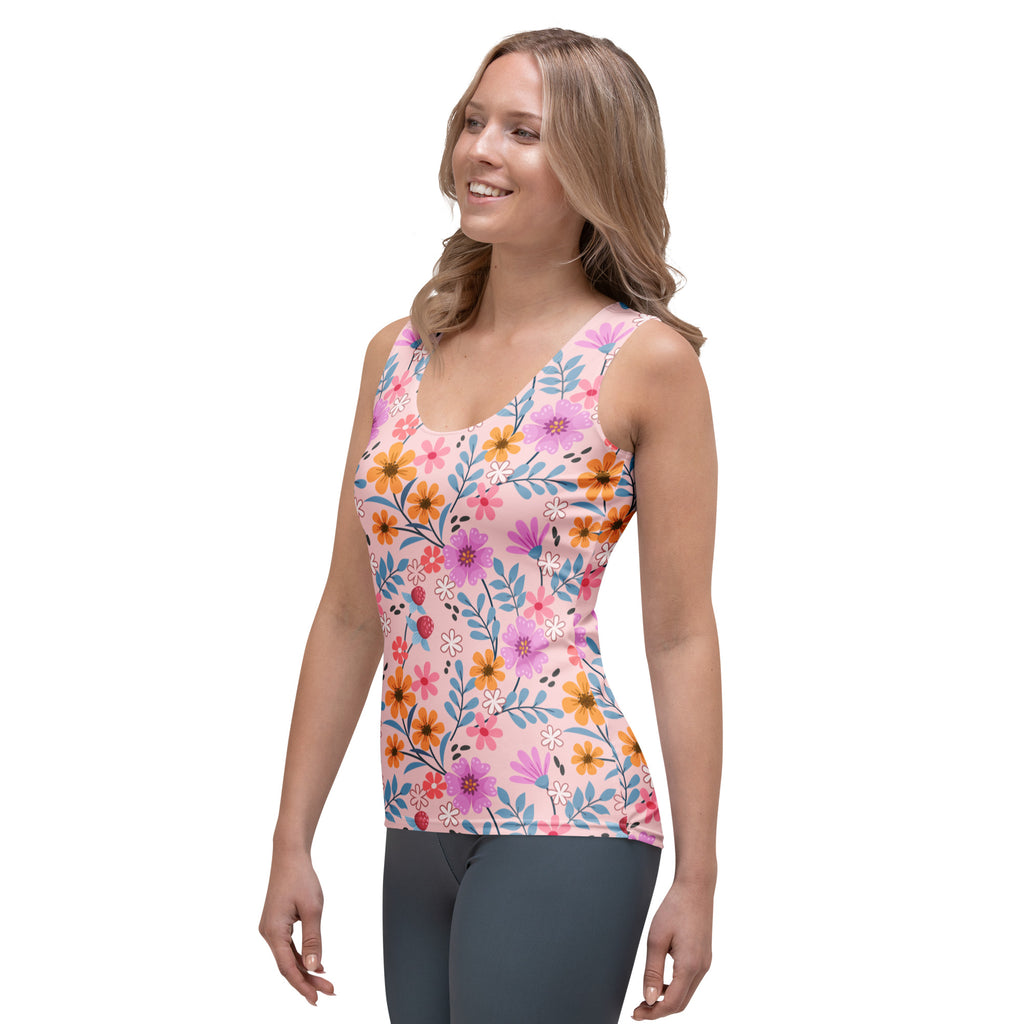 Women’s pink floral tank top with vibrant orange purple and blue flowers made of quick drying buttery soft fabric with UPF 50+