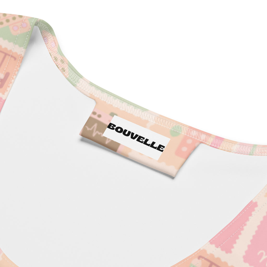 Pastel pink and mint green patterned bikini top with bouvelle label in women’s pink nurse icon tank top with upf 50+ fabric