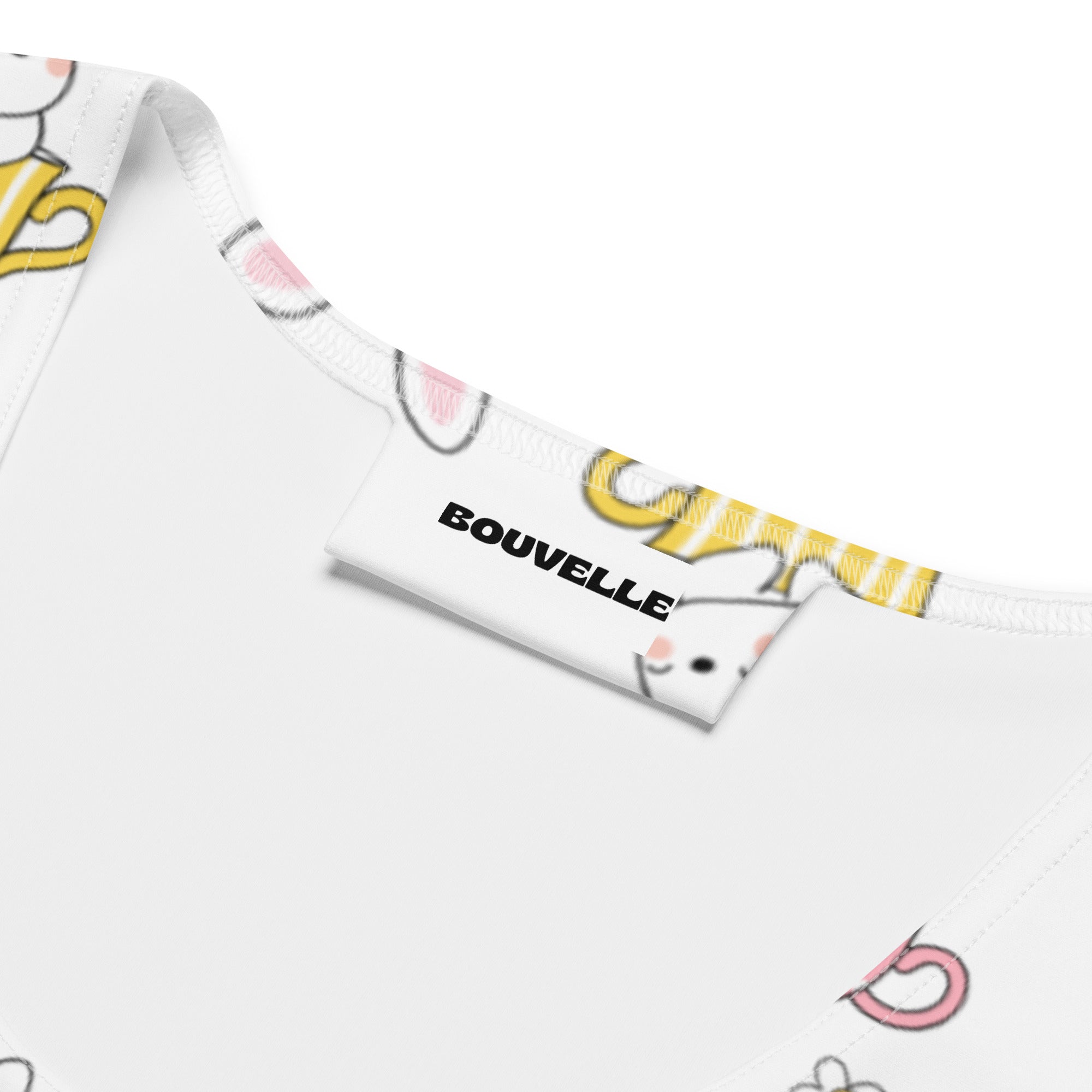 White cotton tank top with playful yellow and pink bunny print buttery soft quick drying fabric upf 50 plus by bouvelle