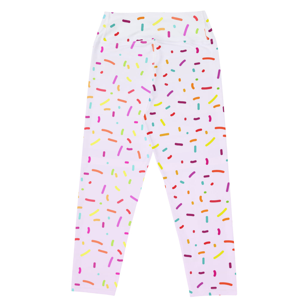 White buttery soft high-rise yoga capri leggings with colorful sprinkle pattern in pink yellow orange green and purple