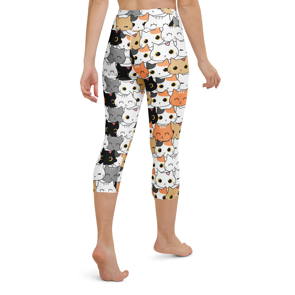 White capri leggings with playful cartoon cats pattern in black gray white and orange buttery soft high-rise yoga pants