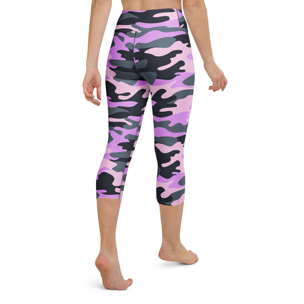 Women’s purple and black camouflage high-rise capri leggings made of buttery soft moisture-wicking stretch fabric
