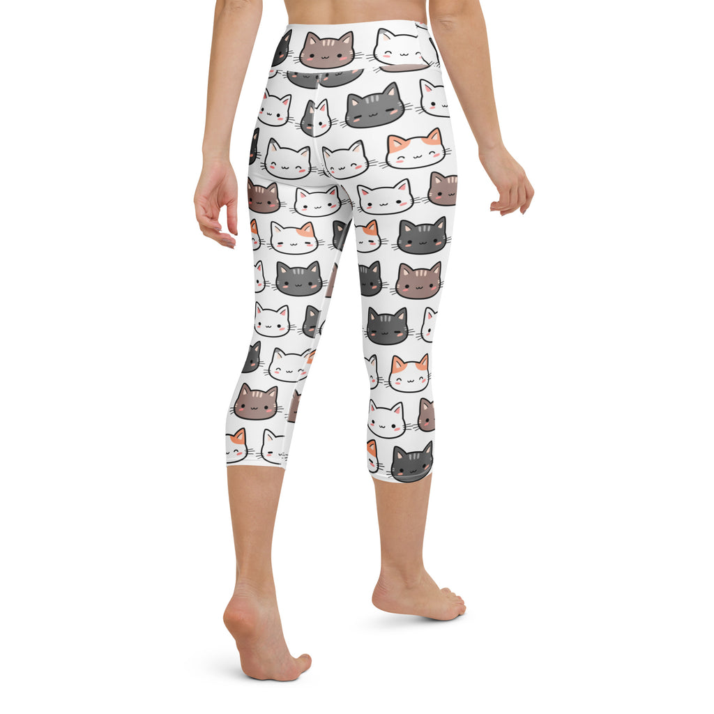 White high-rise capri leggings with colorful cartoon cats made of buttery soft moisture-wicking fabric for yoga