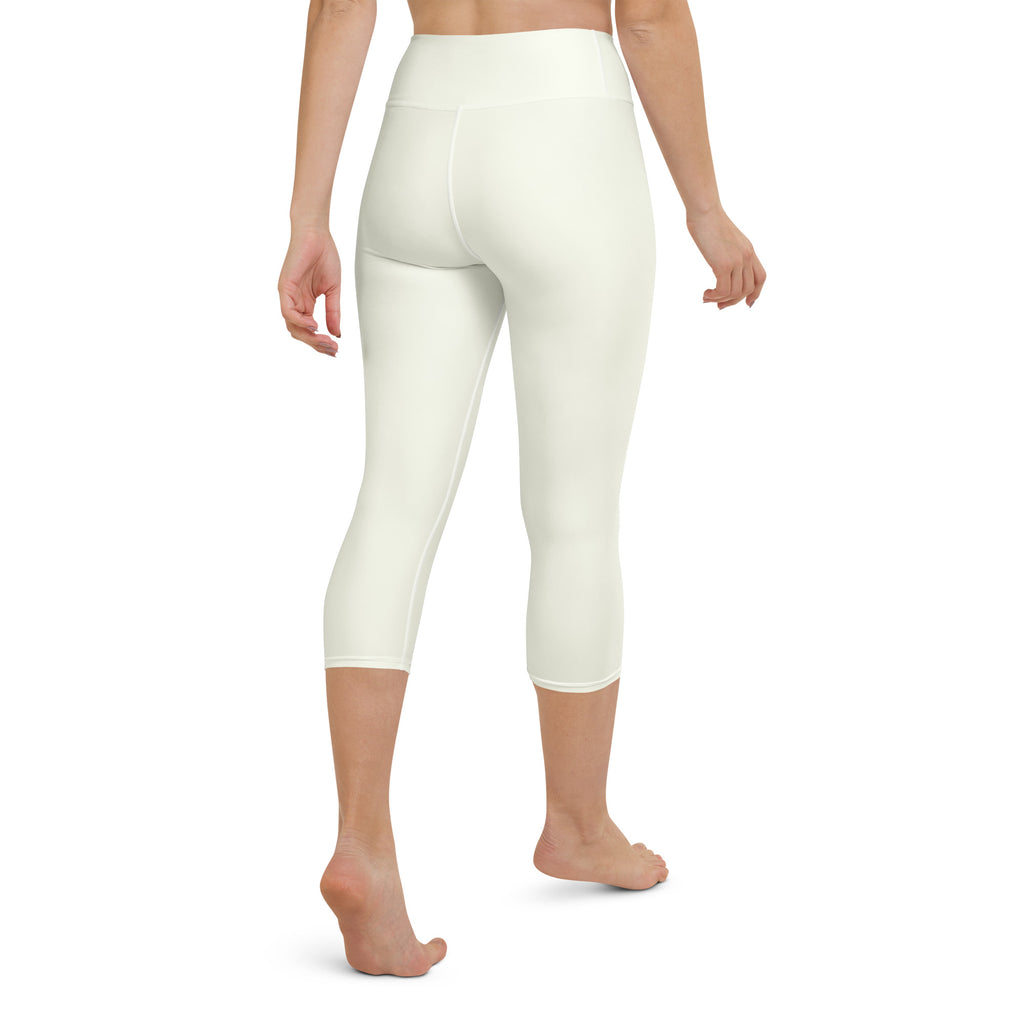Women’s ivory buttery soft high-rise capri leggings with smooth stretchy fabric for moisture-wicking yoga