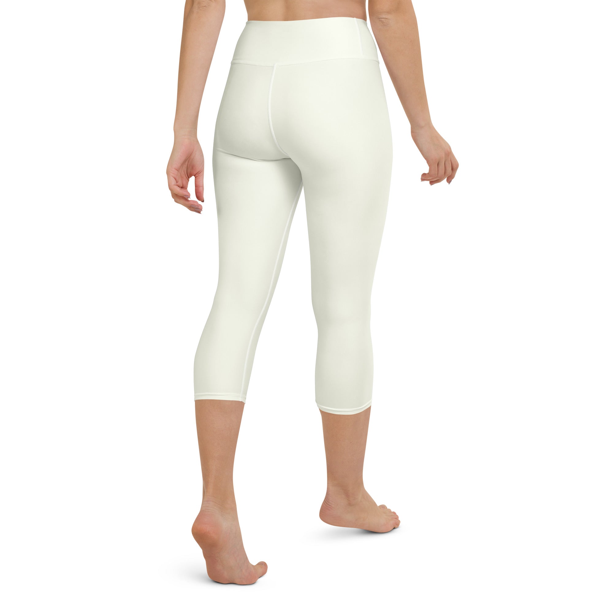 Women’s ivory buttery soft high-rise capri leggings with smooth stretchy fabric for moisture-wicking yoga