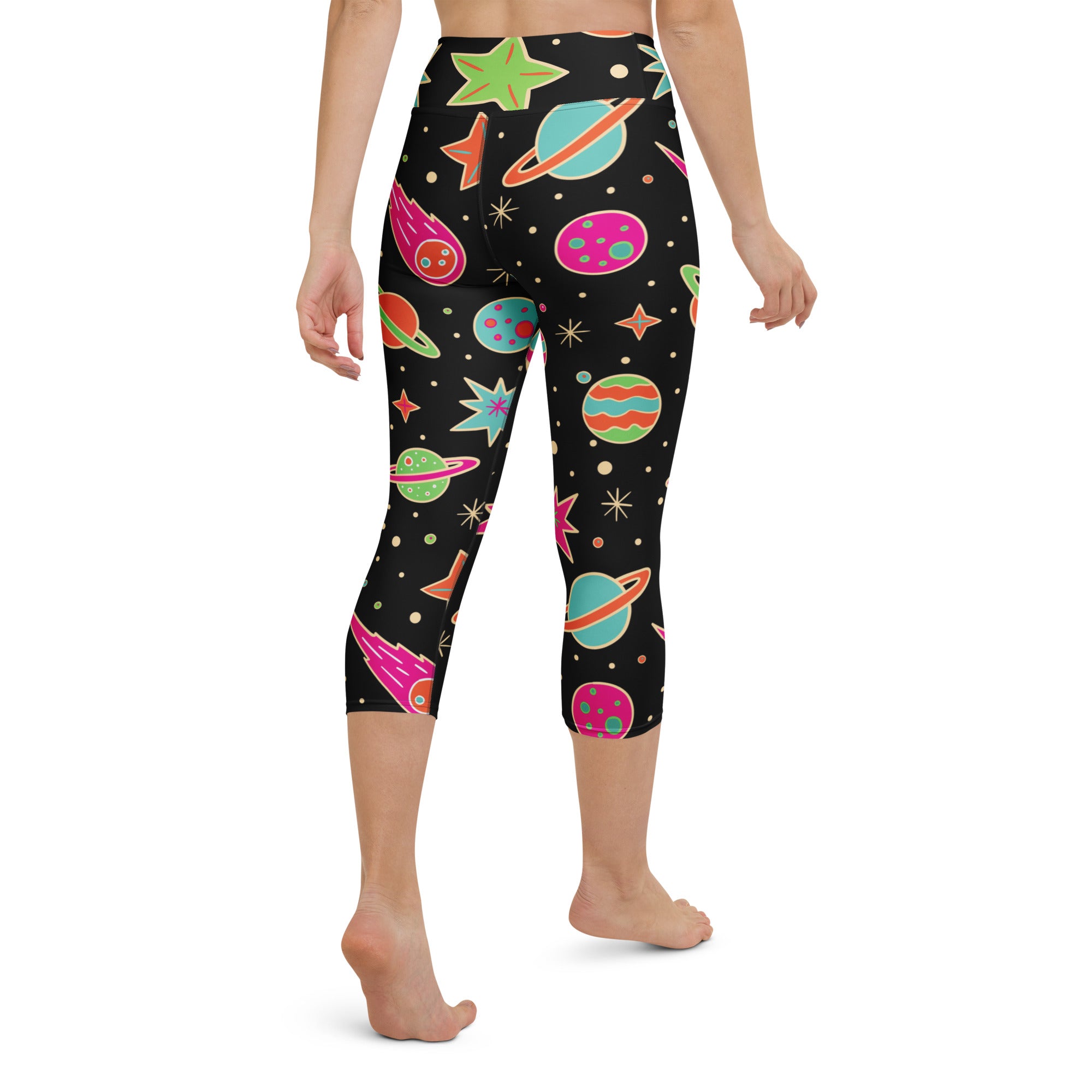 Black high-rise capri leggings with retro neon space pattern made of buttery soft moisture-wicking fabric