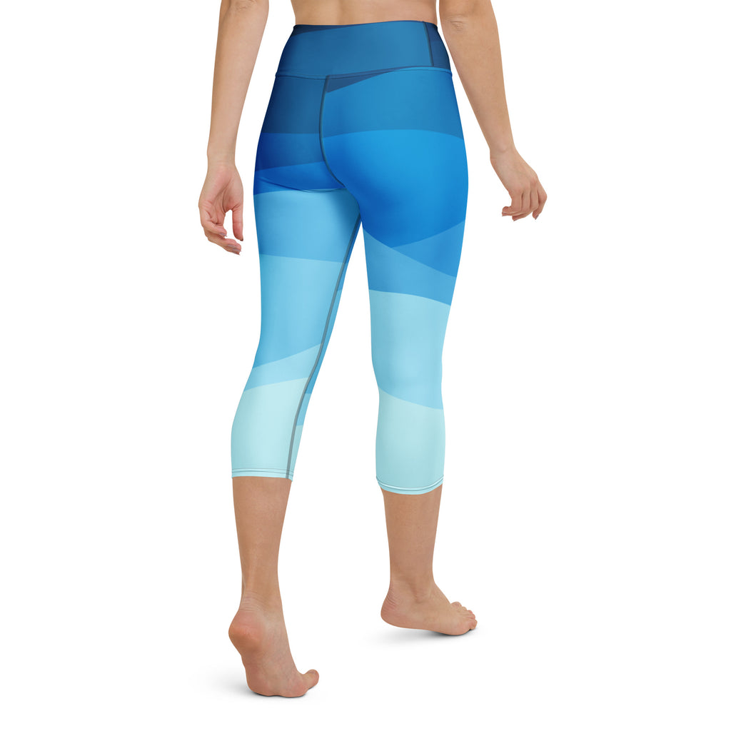 Women’s high-rise blue gradient capri leggings with soft buttery fabric and moisture-wicking stretch for yoga