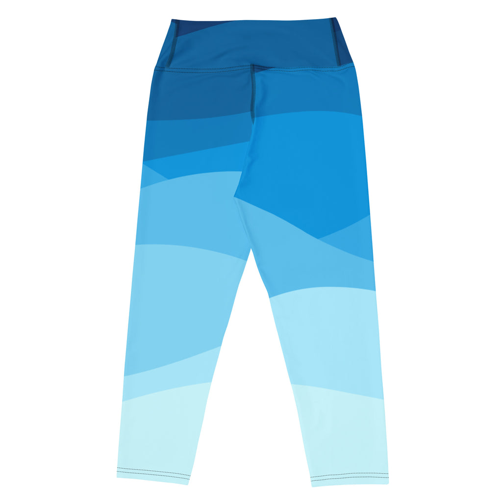 Women’s wavy blue high-rise yoga capri leggings with buttery soft moisture-wicking stretchy fabric