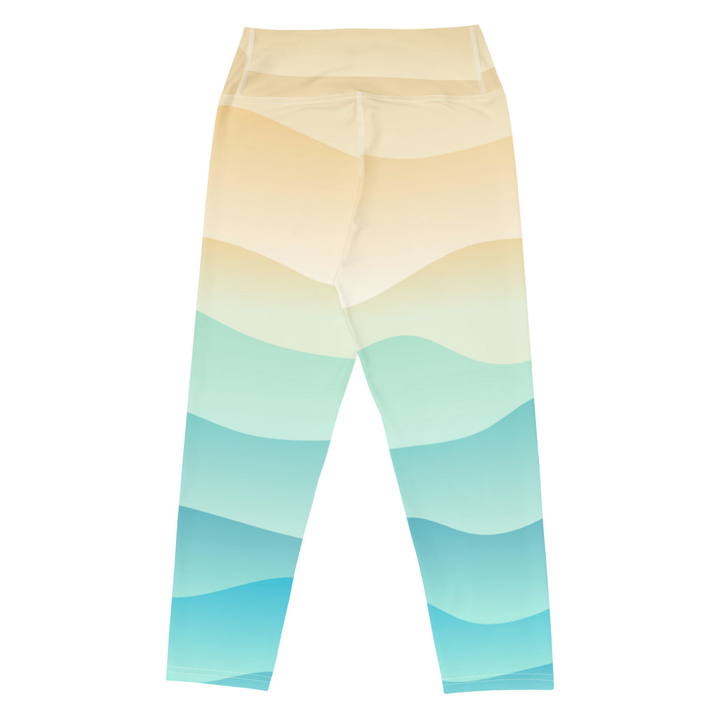 Beige and teal gradient wave-patterned high-rise yoga capri leggings with moisture-wicking soft stretch fabric