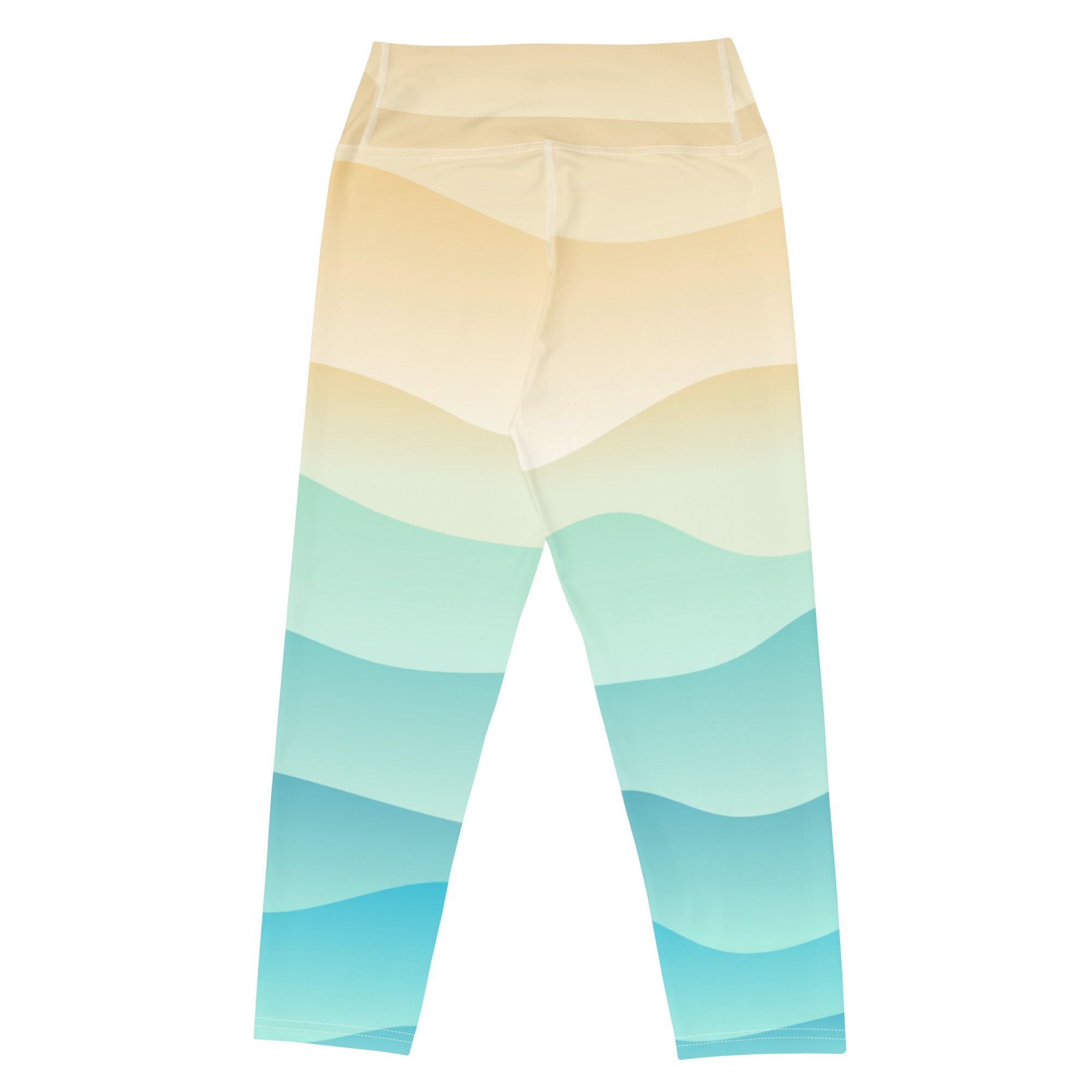 Beige and teal gradient wave-patterned high-rise yoga capri leggings with moisture-wicking soft stretch fabric