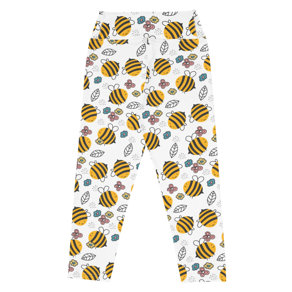 White buttery soft high-rise yoga capri leggings with yellow bumblebee and floral pattern for women