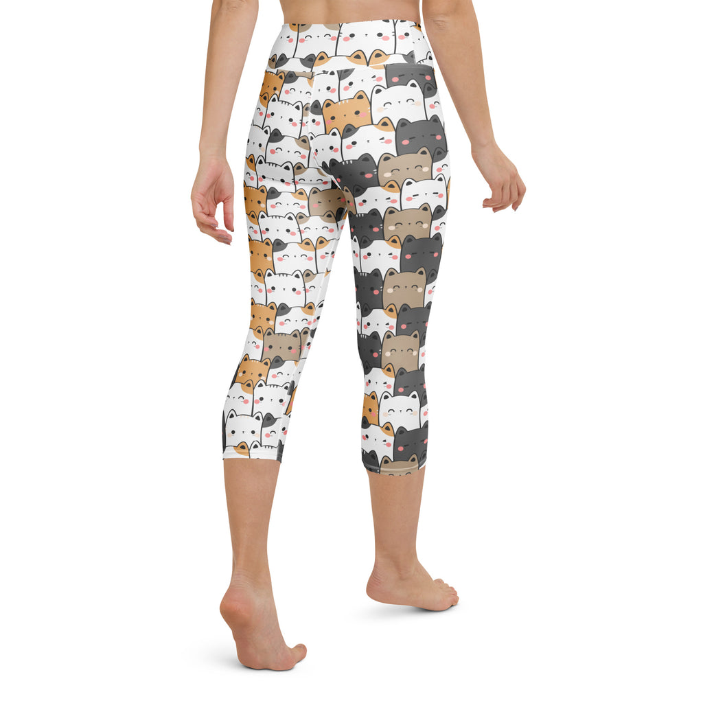 White capri leggings with a playful cartoon cat pattern in black white brown and gray buttery soft high-rise yoga pants