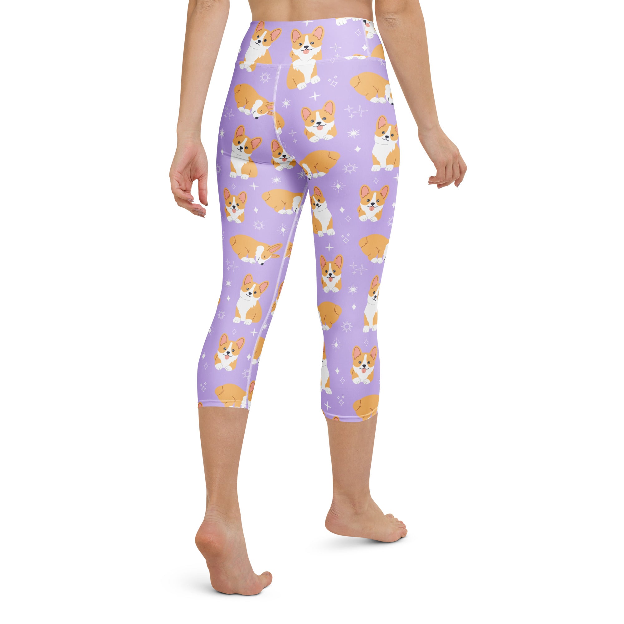 Women’s purple buttery soft high-rise yoga capri leggings with orange and white cartoon corgi pattern and moisture-wicking fabric